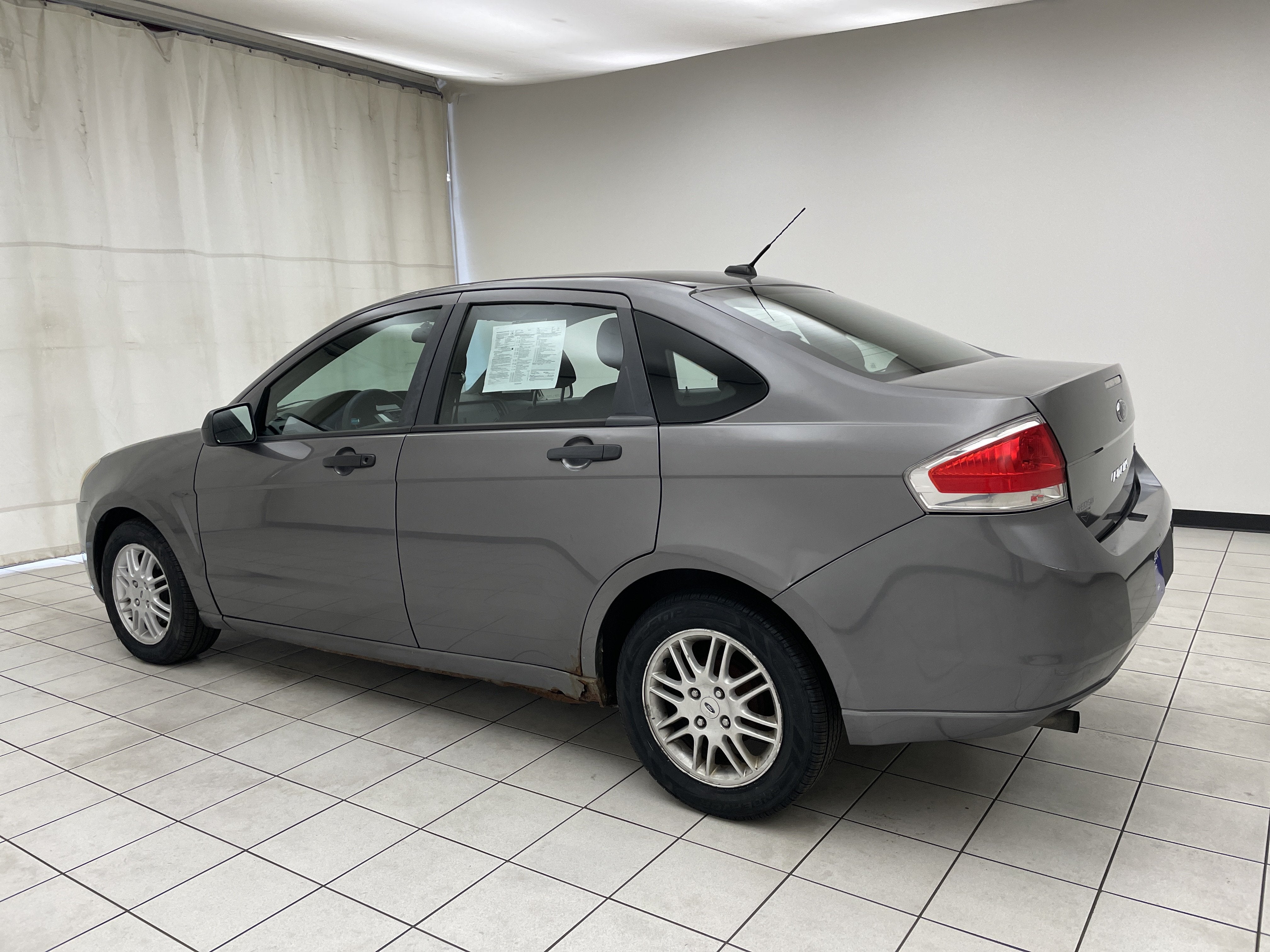 Used 2010 Ford Focus SE with VIN 1FAHP3FN4AW267648 for sale in Sheboygan, WI